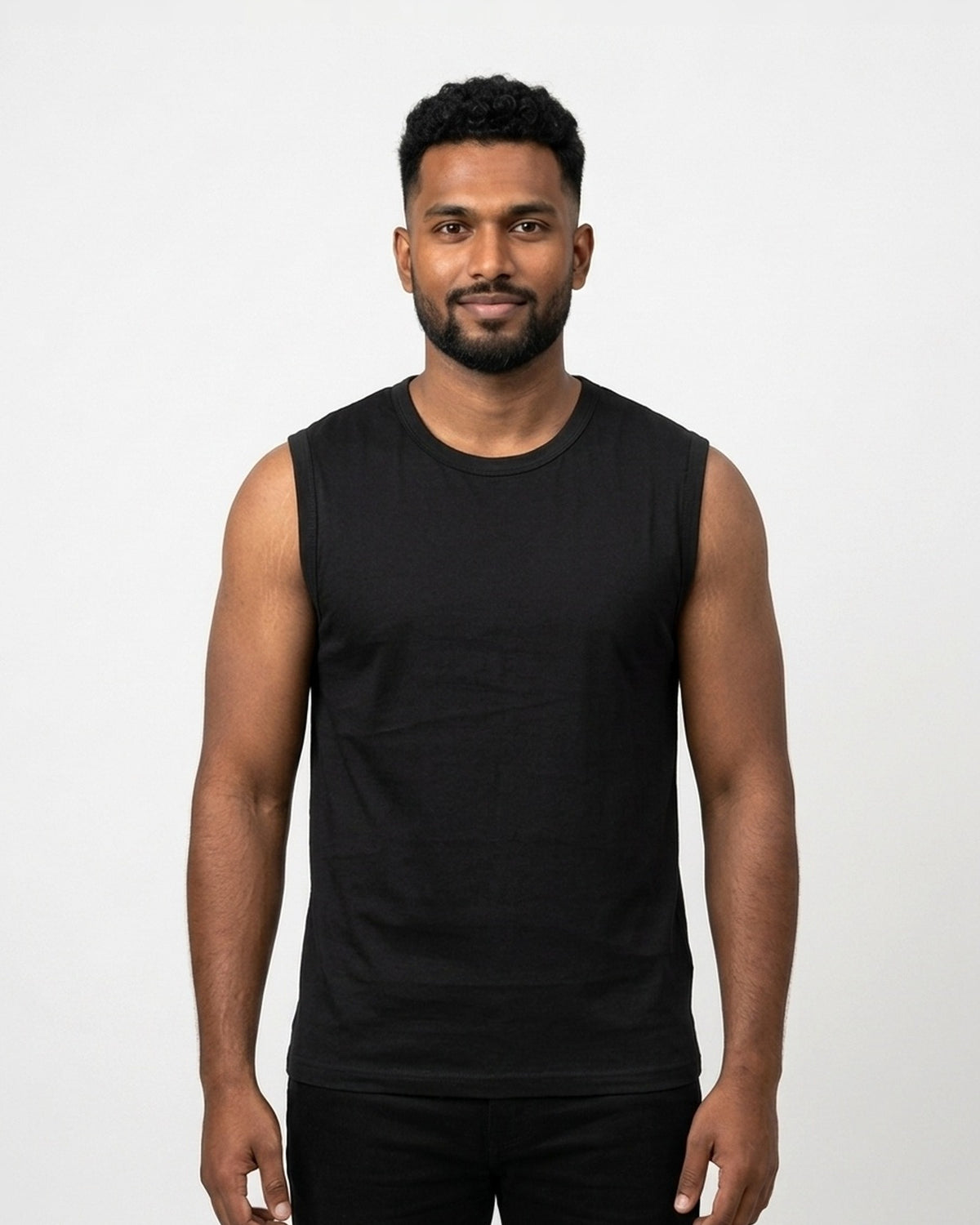 Sleeveless T-Shirt in Black on dusky skin — MULTITHREAD