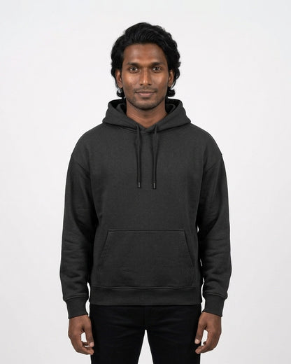 Oversized Hoodie in Black on deep skin — MULTITHREAD