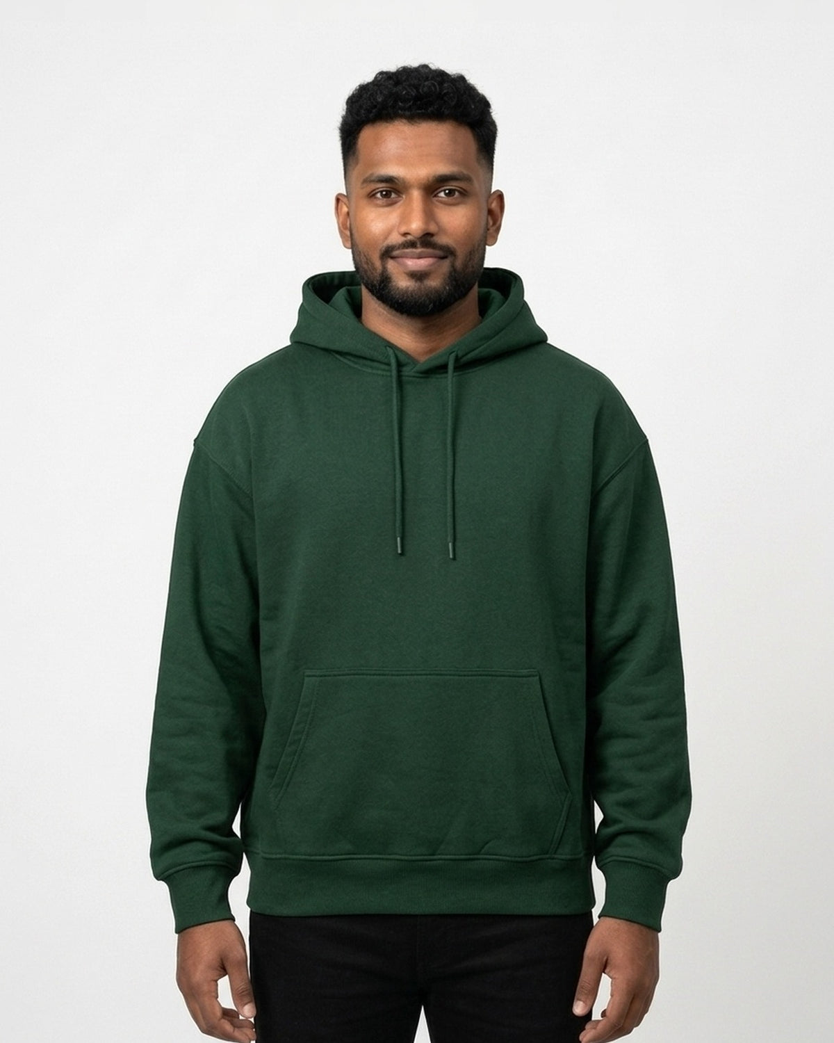 Oversized Hoodie in Bottle Green on dusky skin — MULTITHREAD