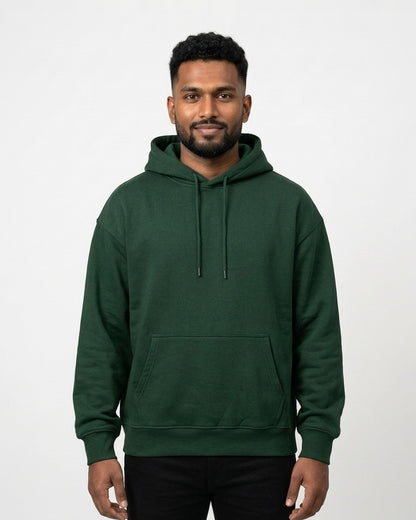 Oversized Hoodie in Bottle Green on dusky skin — MULTITHREAD